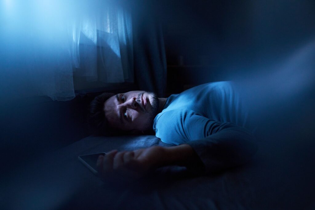 Person reflecting on when to seek mental health treatment